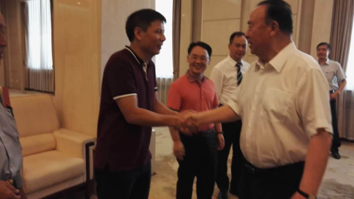 久融金融CEO李煜华（左）会见十一届全国政协副主席白立忱（右）